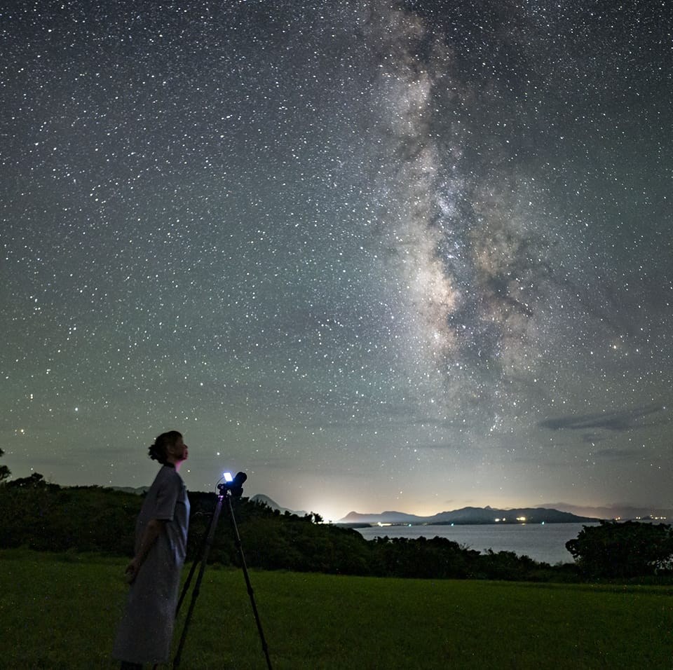 Stargazing tour guide profile photo under the Milky Way at Nagareboshi no Oka, Ishigaki Island