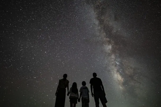 Happy guests enjoying the stargazing tour at Nagareboshi no Oka, Ishigaki Island