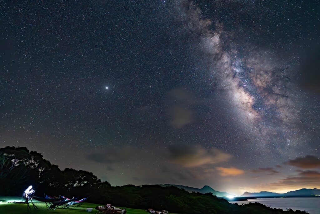 Milky way wide hammock stargazing at Nagareboshi no Oka stargazing spot, Ishigaki Island