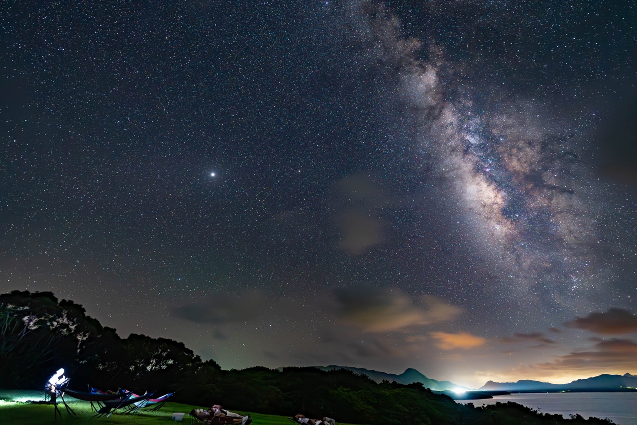 Milky way wide hammock stargazing at Nagareboshi no Oka stargazing spot, Ishigaki Island